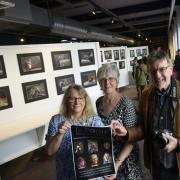 Sheri O’Reilly, Sue McDine and husband Roy McDine with their exhibition laid out at Trowbridge Museum.