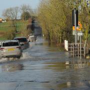 Despite five sets of road closure signs several motorists drove through to cross the flooded causeway at Staverton.