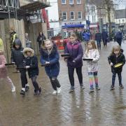 The children’s race gets underway in a wet and slippery Fore Street in Trowbridge.