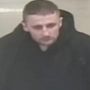 A man police want to speak to in connection to a theft from Sainsbury's