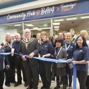 Trowbridge Mayor Cllr Stephen Cooper officially opens the Trowbridge hub at The Shires with the staff.