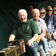Tony Lowe with fellow engineers at the West Wilts Society of Model Engineers give their electric shunter train a test before offering rides for the children.
