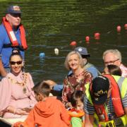 Public figures such as MP Brian Mathew and Melksham's mayor Saffi Rabey enjoy a trip on the river.