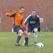 FC Northbridge's Jon Taylor and  Lavington's Delvin Keane battle for possession during Saturday's A and B Cup tie (24093/2)