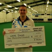 Wayne Snook with his prize from the Clarrie Dunbar Open