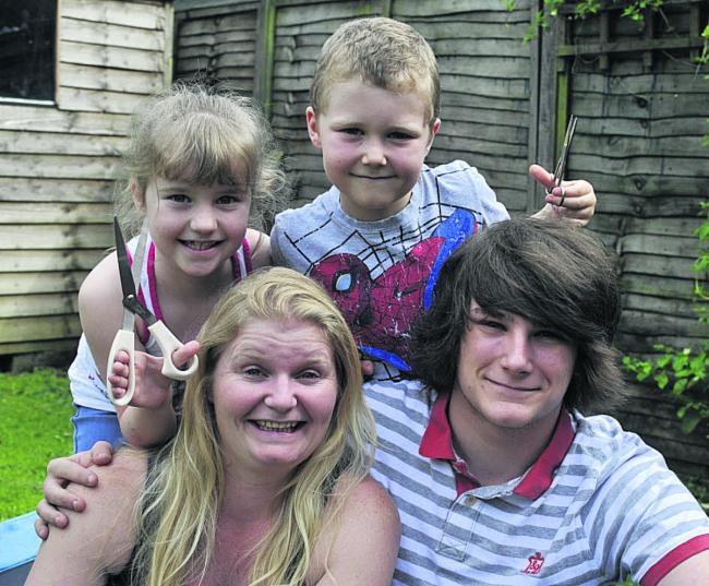 Abbie Wheeler and her eldest son Jean-Luc with Sam, who has epilepsy, and his sister Danielle