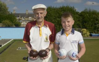Tom White, of Box Bowls Club, with Alfie Holland, 13, of Avon Bowls Club,the oldest and the youngest players at the Spencer Moulton Bowls Club Gala Day in Bradford on Avon Photo: Trevor Porter 67633-2