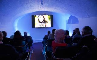 Guests watch Alfred Hitchcock's crime thriller Rear Window at The Screening Room at Parade House