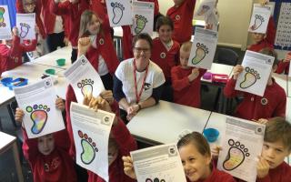 Wicked Weather Watch Director Rhianna Davies-Smith working with students at Yeo Moor Primary School.