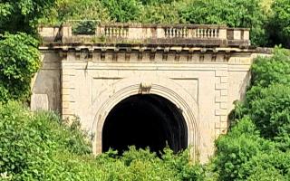 Investigations into a damaged railway tunnel portal are expected to begin next year as residents express sadness at missing balustrade.