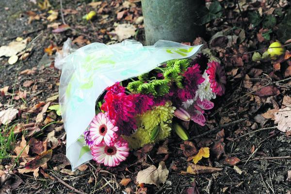 Floral tributes laid at the scene of the crash (26858029)