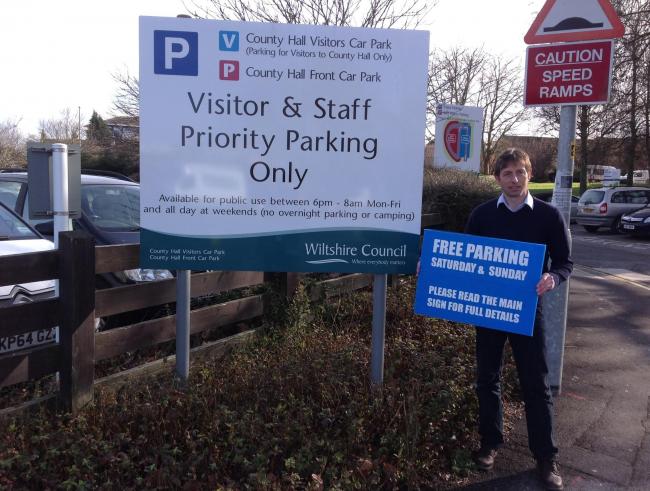 Cllr Edward Kirk raising awareness about free parking in Trowbridge on weekends.